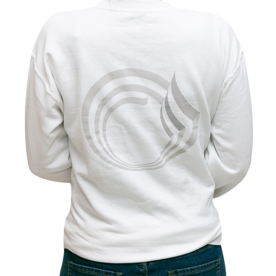 A person is seen from behind wearing the Guggenheim Rotunda Sweatshirt, a unisex crew neck fleece featuring a large, light gray circular and striped abstract design on the back. Only the upper body is visible.