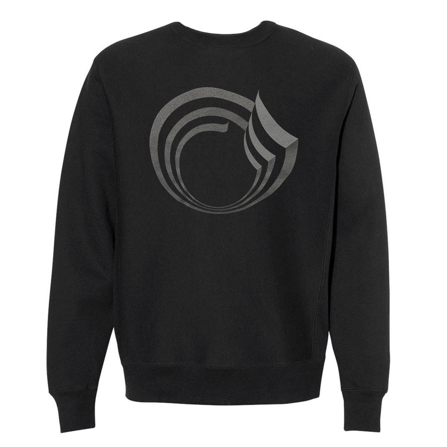 The Guggenheim Going Dark Rotunda Sweatshirt is a black crewneck with a bold abstract silver circular graphic on the back, featuring curved, layered lines for a contemporary look.