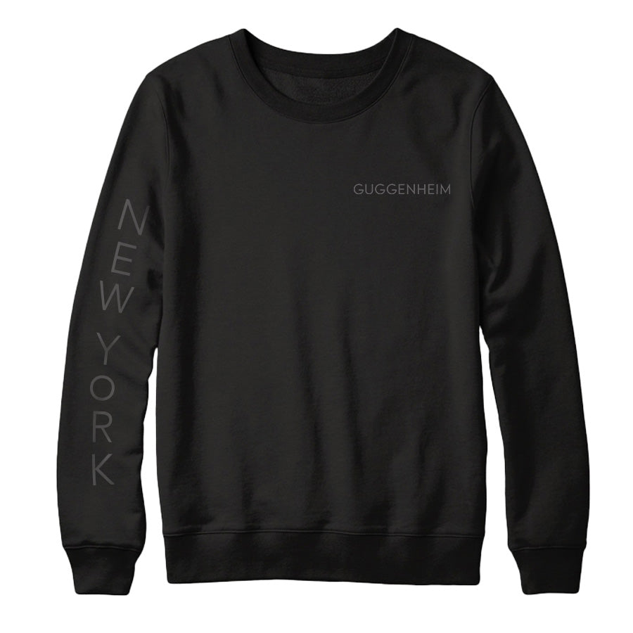 The Guggenheim Going Dark Rotunda Sweatshirt is a black sweatshirt featuring white text.