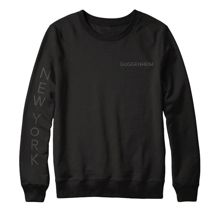 The Guggenheim Going Dark Rotunda Sweatshirt is a black sweatshirt featuring white text.