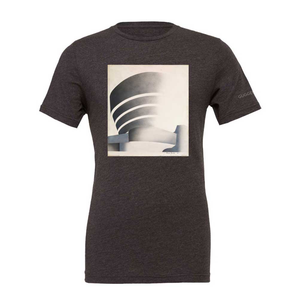 The Guggenheim Richard Hamilton T-Shirt is a charcoal gray unisex cotton tee with a black and white abstract architectural design on the front and "GUGGENHEIM" on the sleeve—perfect for art lovers.